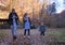 Family with children hiking in the woods