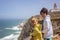 Family with children, siblings, visiting the most west point of Europe, Cabo Da Roca, during family vacation summertime