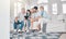 Family, children and tablet with parents, grandparents and girl on a sofa in the living room of their home together