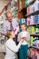 Family choosing items in pharmacy