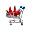 Family Christmas purchases or New Year discounts at the supermarket or online store. Four Santa Claus hats in a shopping trolley.