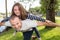Family concept father make piggyback to child daughter