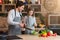 Family Cooking. Cheerful Dad And Little Daughter Preparing Healthy Lunch Together