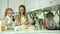 Family Cooking. Mother With Daughters Preparing Dough For Baking