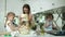 Family Cooking. Mother With Daughters Preparing Dough For Baking