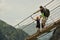 Family crossing the suspension bridge