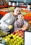 Family customers buying ripe fruits