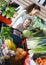 Family customers buying ripe fruits