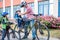 Family cycling, father with happy kid riding bike outdoors