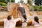 Family, dad and children bathe, swim in outdoor dirty hot springs. Thermal water bath pool and healthy natural, clay and