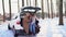 Family with daughters sitting in the trunk of car