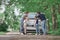 Family discusses the road map on a family trip