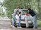 Family discusses the road map on a family trip