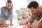 Family drawing, creative smile and girl on living room floor with parents, writing on paper and happy with game in