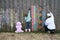 Family Drawing on Fence