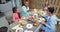 Family Eating Breakfast Alfresco