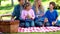 Family eating picnic