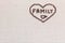 Family enclosed in heart shape on linea texture aligned top-right