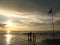 Family enjoy sunrise at the sea at Hua Hin beach, Thailand.