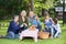 Family Enjoying Healthy Picnic In Park