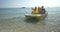 Family enjoying sea ride on pedal boat