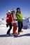 Family enjoying skiing in alps