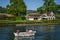 Family enjoying sunny day at Henley on Thames.