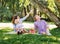 Family enjoying their leisure having a picnic