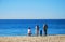 Family enjoying view at Main Beach, Laguna Beach, California.