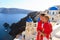 Family enjoying view of santorini