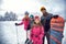 Family enjoying winter sports and vacation on snow in mountains