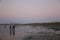 Family enjoys winter walks on the beach