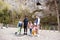 Family explores at Punkva Caves outdoor near rocks, Czech Republic