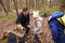 Family exploring nature together in a wood, close up