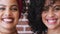 Family, face and woman twin sisters relax and laughing together against a brick wall, happy and proud. Cheerful, smile