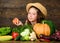 Family farm festival concept. Traditional autumnal fest. Farm activities for kids. Girl kid farm market with fall