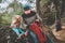 Family father and daughter child in forest travel with backpack camping picnic outdoor