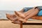 Family feet on beach