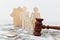 Family figure with judge gavel and house. Family law