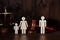 Family figures with judge gavel. Divorce and separation concept