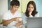 Family financial crisis. Stressed young couple looking at issues notification from bank about late payment home loan credit