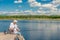 Family fishing on a beautiful lake