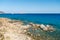 Family fishing on rocky coast of Corsica