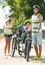 Family of four traveling by bicycles