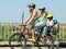 Family of four traveling by bicycles