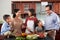 Family gathered in kitchen