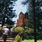 Family going to Caleruega, Church surrounded by pine trees