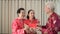 Family greeting red envelop at Chinese New Year celebration