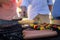 Family grilling patties, vegetables and sausages on the barbecue grill