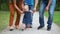 Family Guiding Baby Girl with the First Steps